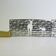 Illustration for article titled Intricate shadow silhouettes carved out of butcher's knife blades